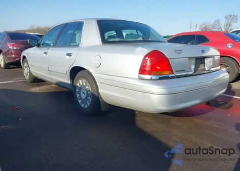 2003 Ford Crown Victoria Standard z USA, uszkodzony, nr VIN 2FAFP73W23X143591